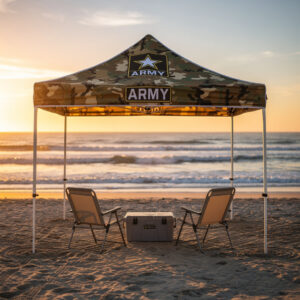 Army camouflage popup tent on beach at golden hour